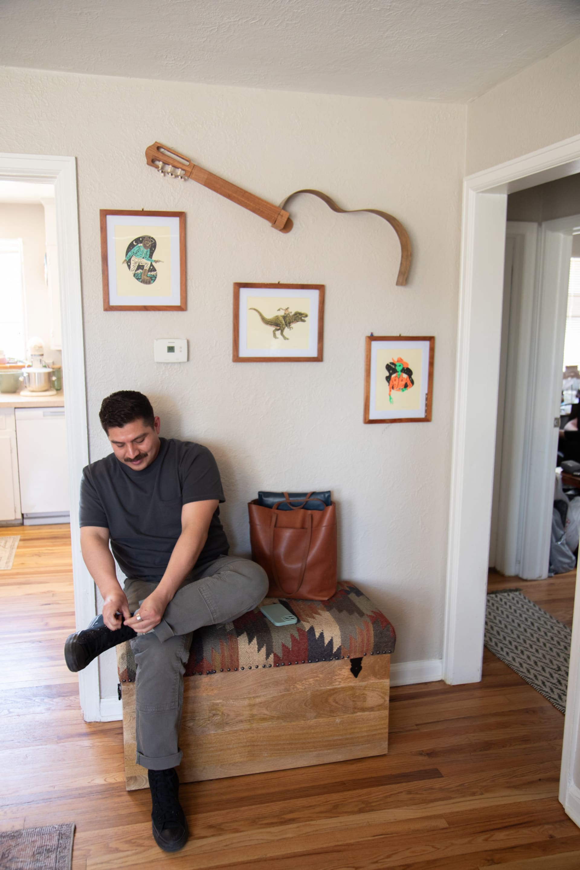 Furniture Row employee using Kilim Chests in his home