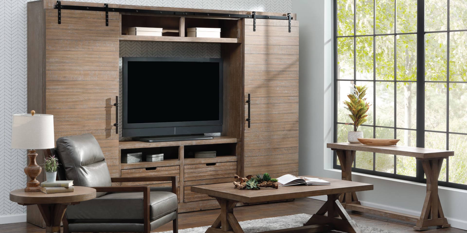 Decorated Room featuring the Theodore Theater Wall, Coffee Table, End Table, Sofa Table and Perry Park Accent Chair